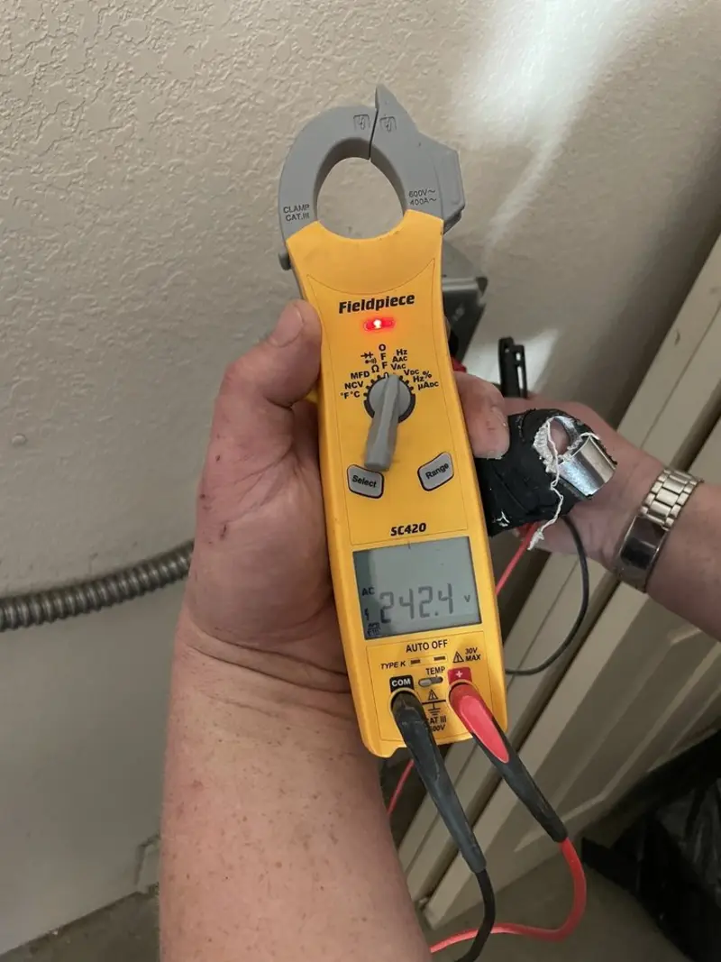 Voltage testing with clamp meter during Hot Tub / Pool Electrical Wiring in Prospect Park